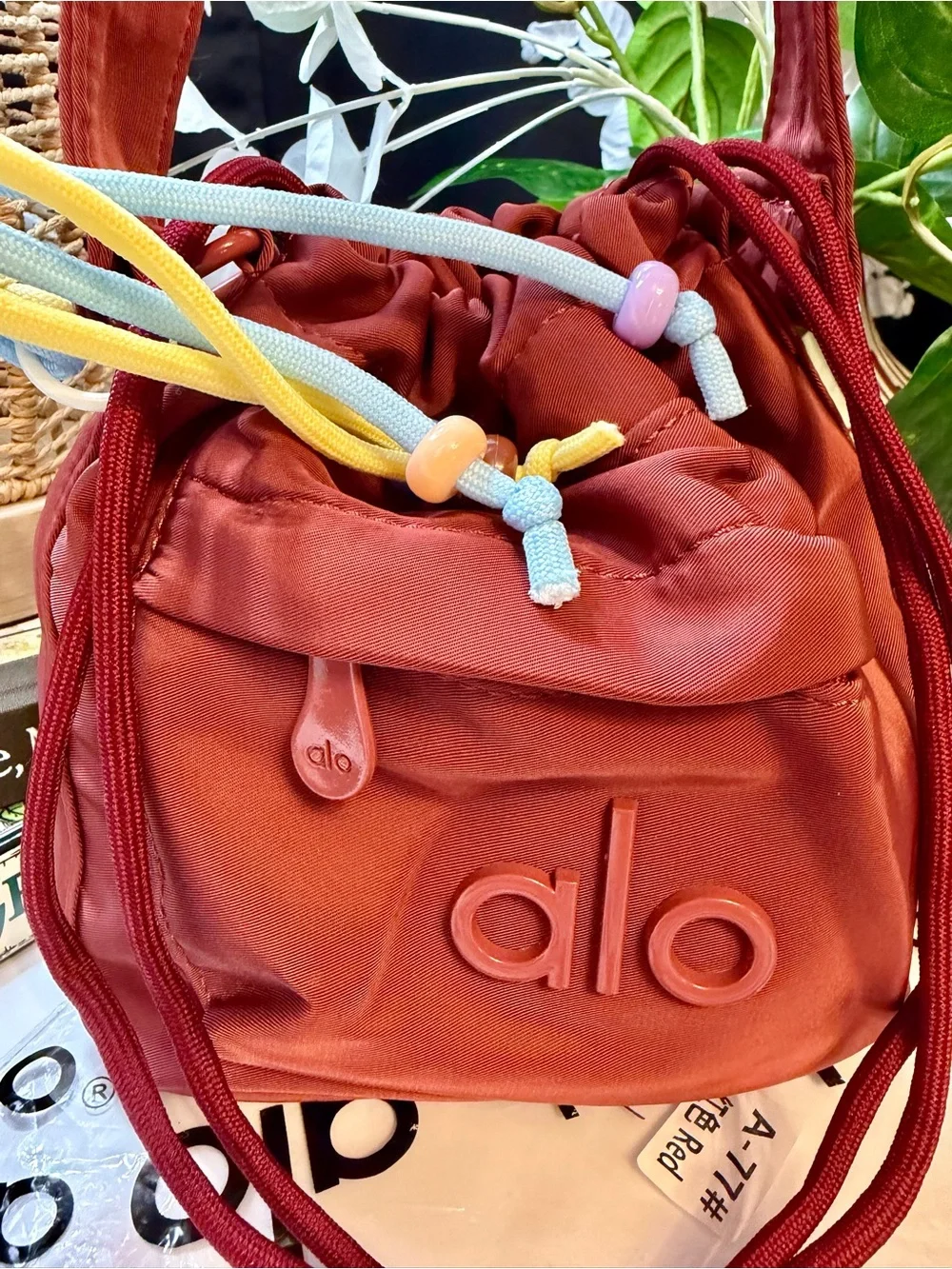 ALO Yoga Burgundy  Drawstring Mini Bucket Bag with Multicolor Cord Tassels